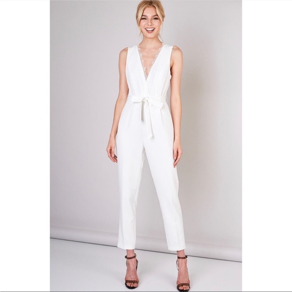 DO + BE white jumpsuit with eyelash lace trim, v neck, belt, and 2-button back. - Picture 1 of 4